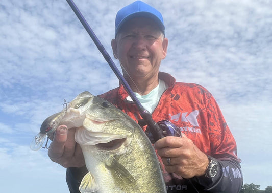 Catching large bass with baitcast rod and reel combo