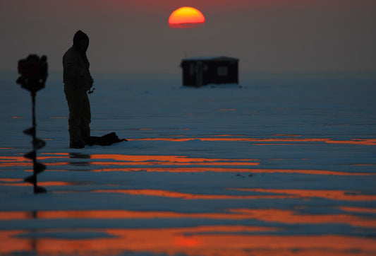 Ice fishing on Mille Lacs Lake MN at sunrise