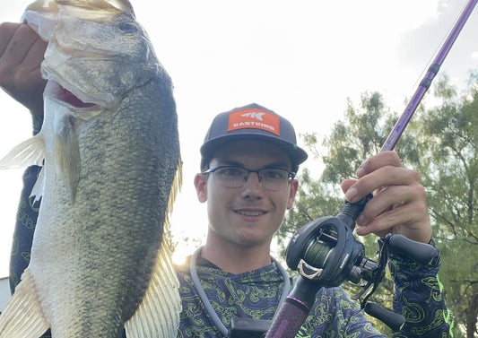 Close-up of KastKing reel and rod combo on a boat deck in October.