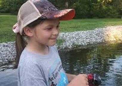 Kids fishing on a pond with KastKing spincast reel.